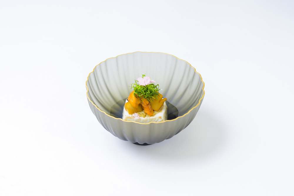 Sesame milk tofu Kintsuba (butterbur miso, fire-cured sea urchin, grilled bamboo shoots, fried green onions, cherry blossom petals)